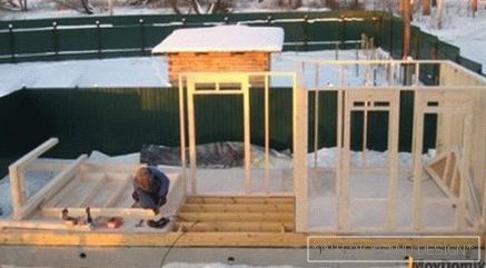 Assembling the frame walls of the house on the Finnish technology